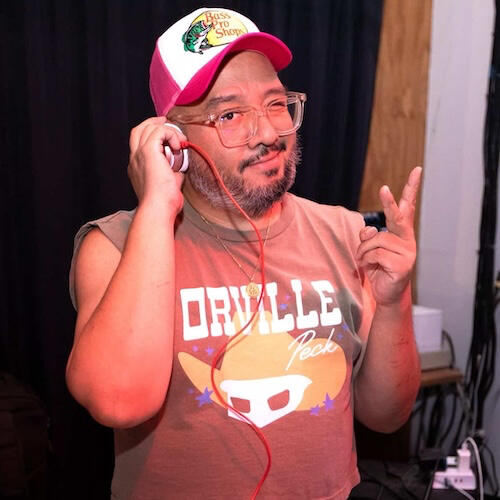 photo of DJ Ayumi Please with headphones on