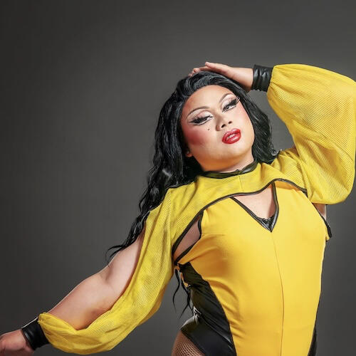 Tori Tia in a yellow outfit
